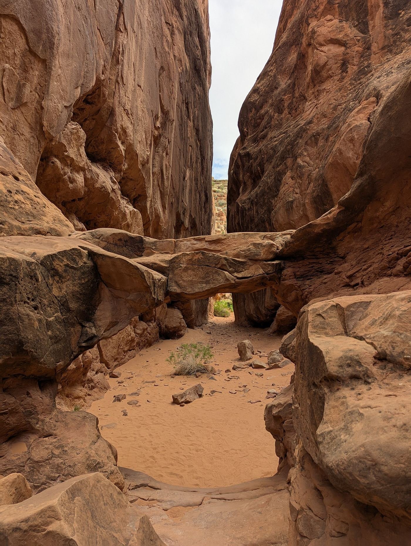 A narrow sandstone fin corridor inside the Fiery Furnace at Arches National Park