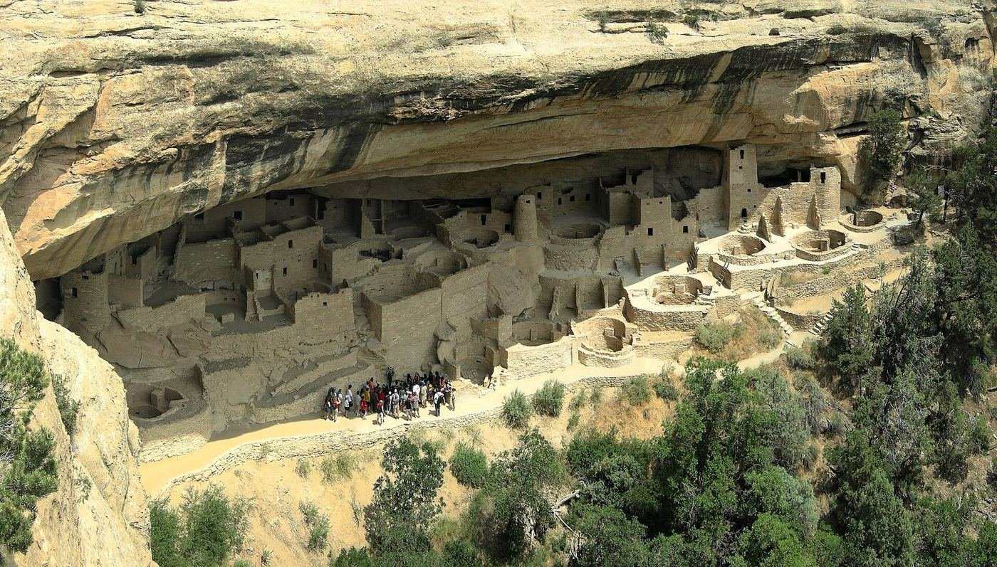 Cliff Palace, a large Ancestral Puebloan cliff dwelling tucked under a sandstone overhang at Mesa Verde