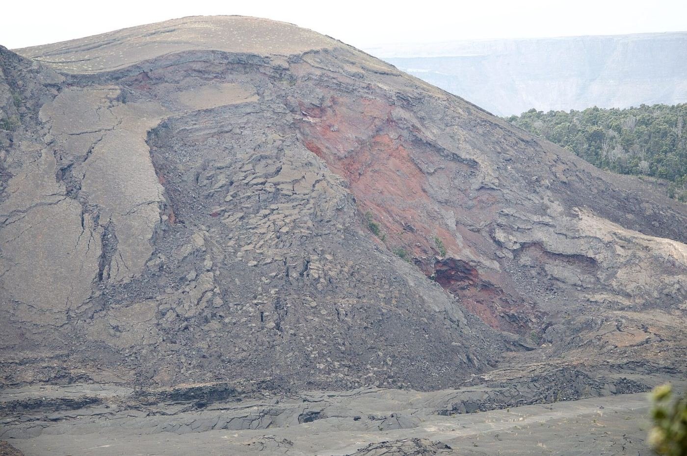 The steaming, lava-covered floor of Kīlauea Iki crater in Hawaiʻi Volcanoes National Park