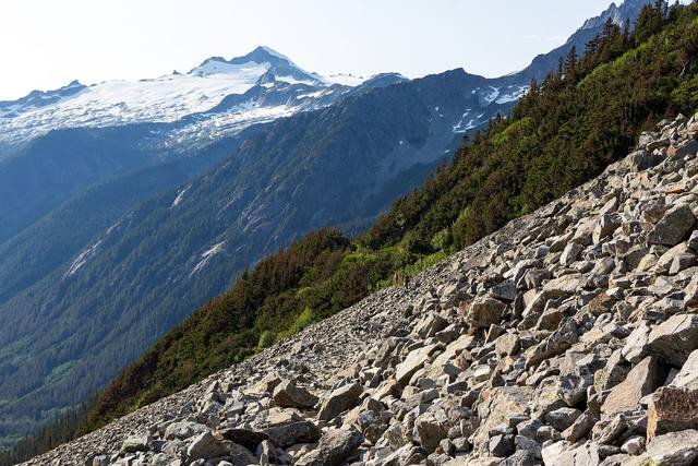 A glaciated peak above a boulder slope in the North Cascades